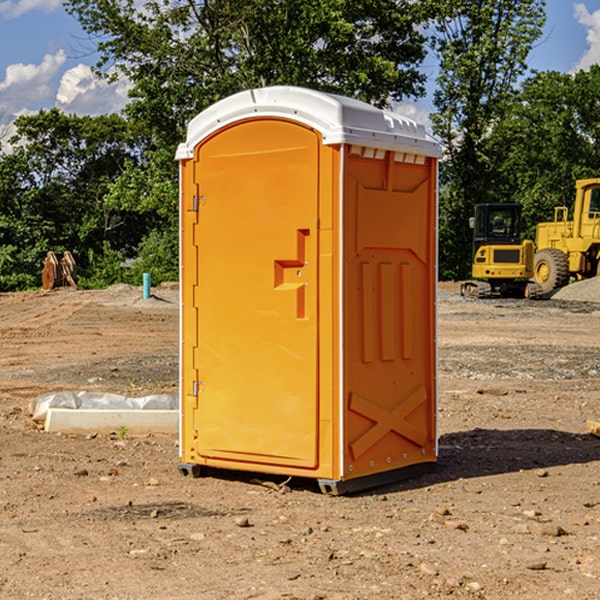 how often are the portable toilets cleaned and serviced during a rental period in Adams County